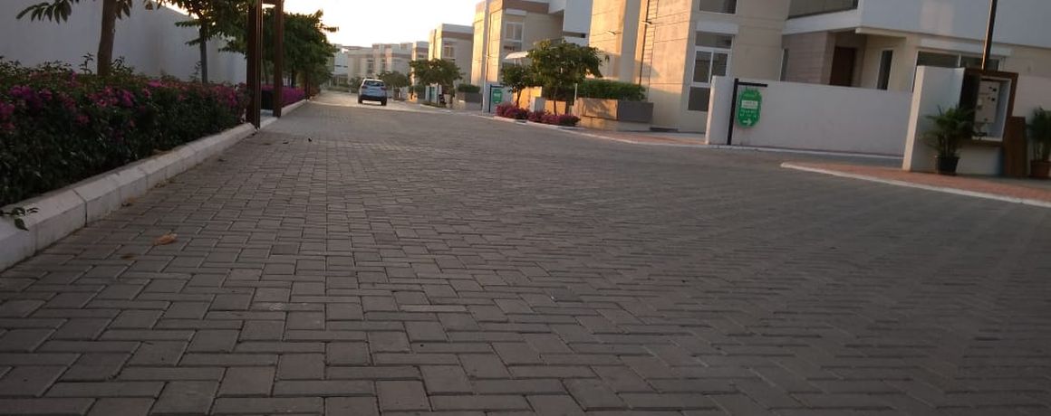 Internal street with completed villas – earlier phase, actual photograph